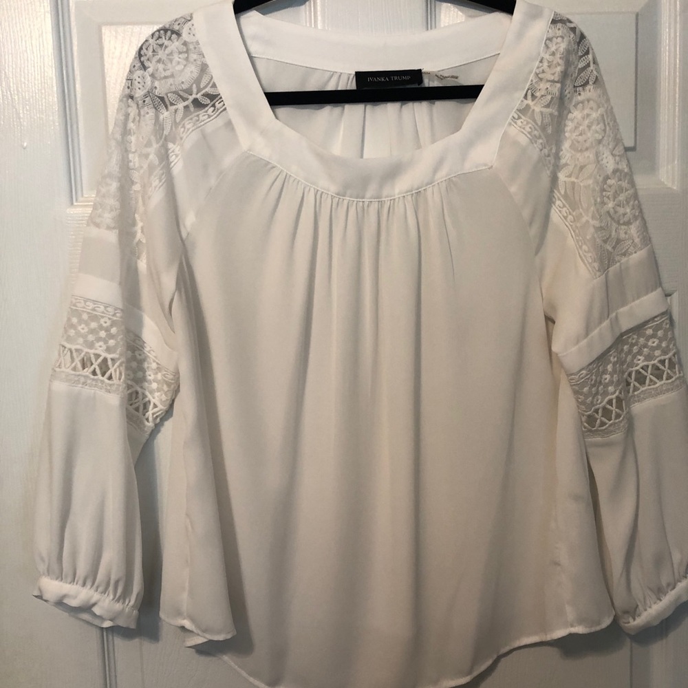 Ivanka Trump white dressy blouse.